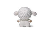 Completed Sheep amigurumi on white background.