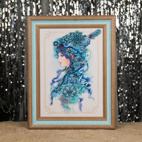 Beadwork kit 'Winter' by Charivna Mit, featuring a girl in a winter setting, designed for seasoned embroiderers.