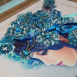 Charivna Mit 'Winter' Beadwork kit, featuring a winter-themed design with a girl, aimed at intermediate-level embroiderers.